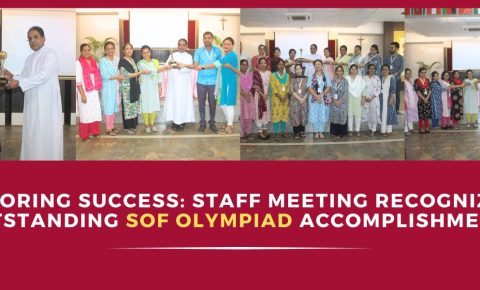 Honoring success: staff meeting recognizing outstanding sof accomplishments